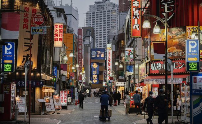 people-walking-on-japan-street-at-nighttime
